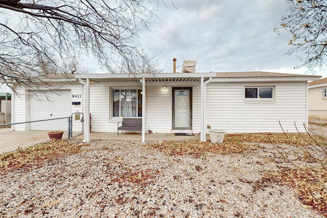 single story home featuring a garage