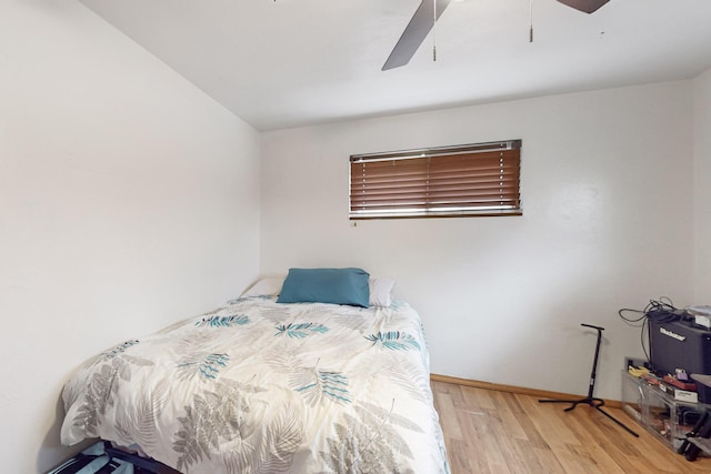 bedroom featuring ceiling fan and wood-type flooring