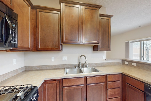 kitchen featuring sink and black appliances