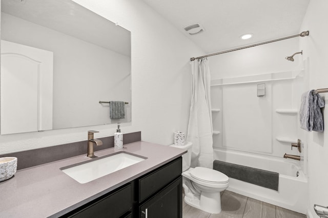 full bathroom with vanity, toilet, and shower / bathtub combination with curtain