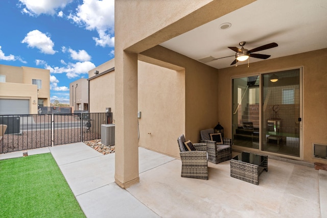 view of patio featuring outdoor lounge area, ceiling fan, and central air condition unit