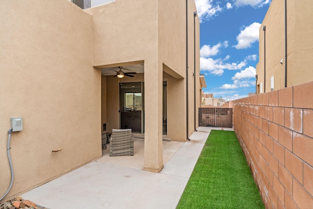 view of patio / terrace with ceiling fan