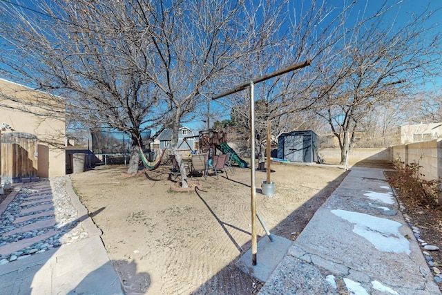 view of yard featuring a playground and a trampoline