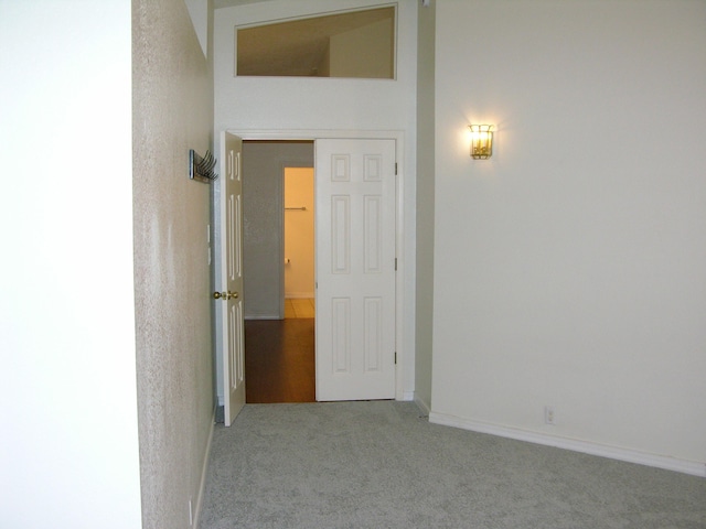 corridor featuring carpet