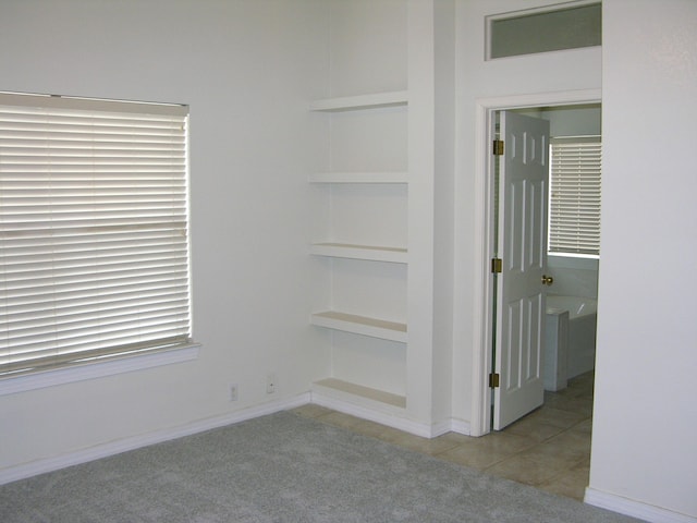 interior space featuring built in shelves