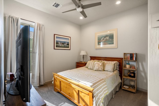 carpeted bedroom with ceiling fan