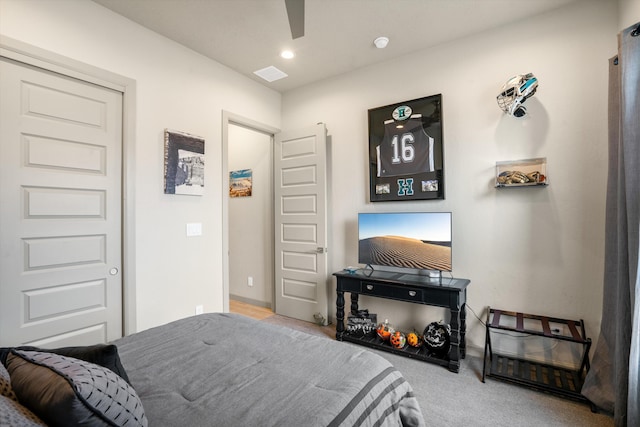 bedroom with ceiling fan and carpet flooring