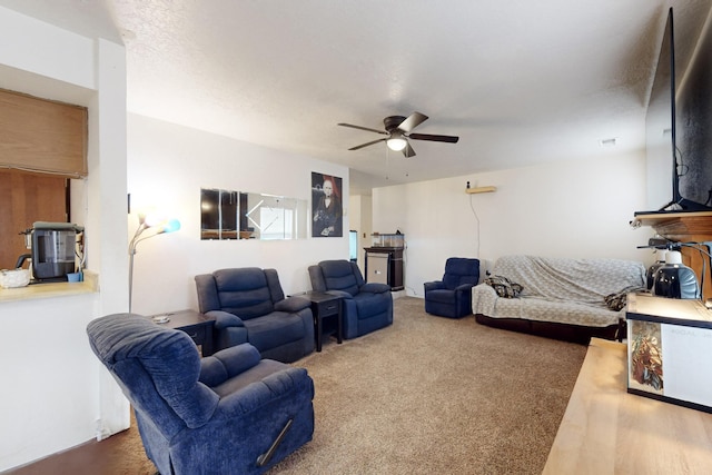 living room with carpet flooring and ceiling fan