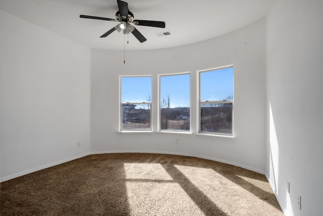 carpeted empty room with ceiling fan