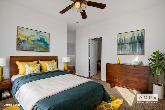 carpeted bedroom with ceiling fan