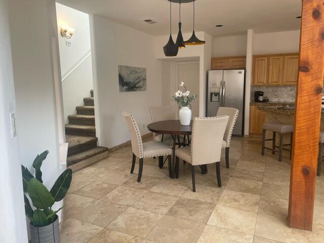 dining area with stairs