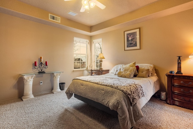 bedroom with ceiling fan and carpet