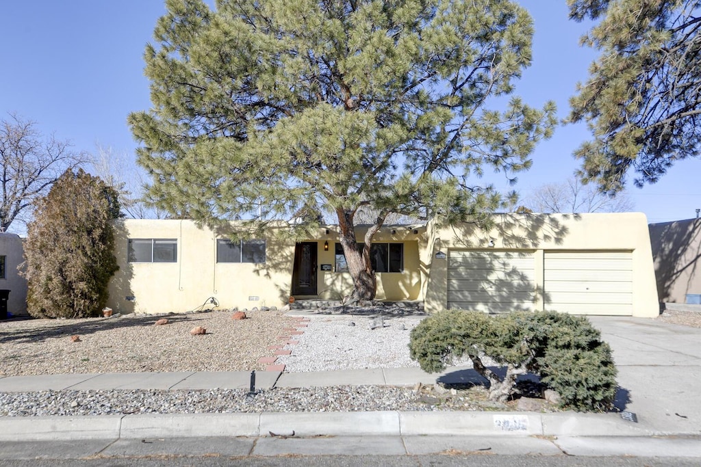 view of front of home with a garage