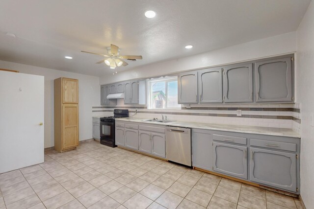 tiled dining area with sink and ceiling fan