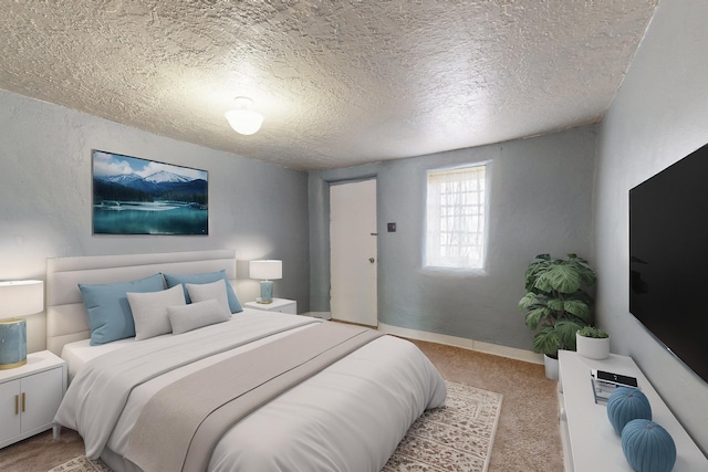 carpeted bedroom featuring a textured ceiling