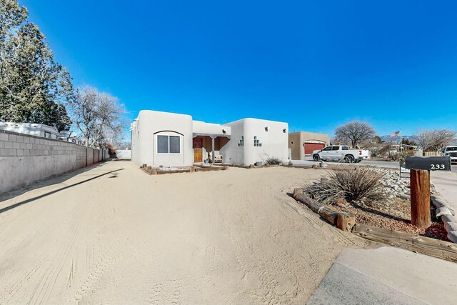 view of adobe home