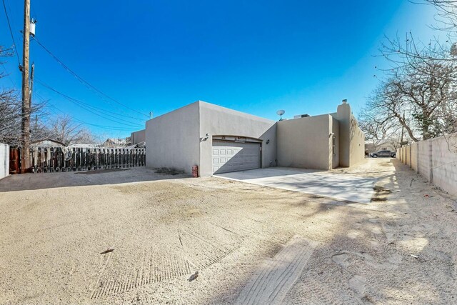 view of home's exterior featuring a garage