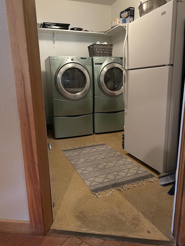 washroom with independent washer and dryer