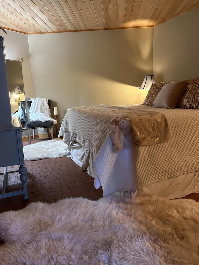 bedroom featuring wooden ceiling