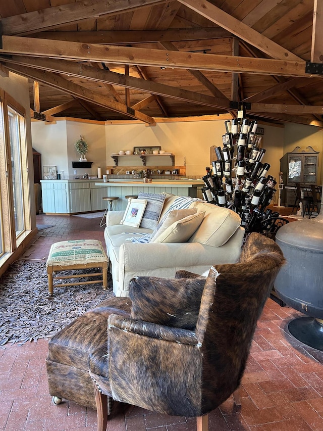 living room featuring lofted ceiling with beams and wood ceiling