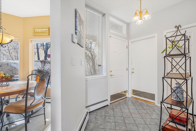 entryway featuring a chandelier