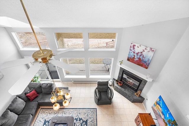 living room with light tile patterned floors and a wealth of natural light