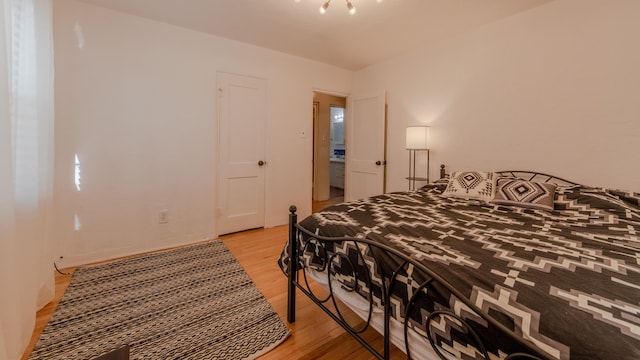 bedroom with light hardwood / wood-style flooring