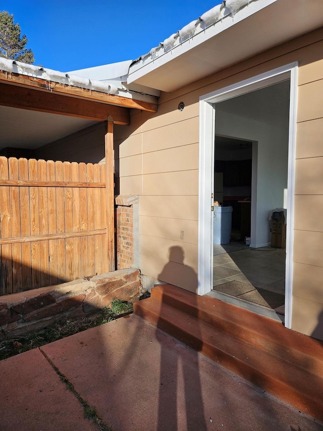 view of patio / terrace featuring fence