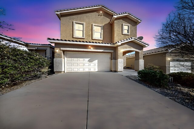 view of front of home with a garage