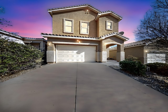 view of front of house with a garage