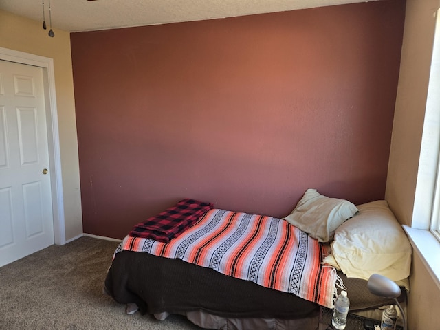 bedroom featuring carpet