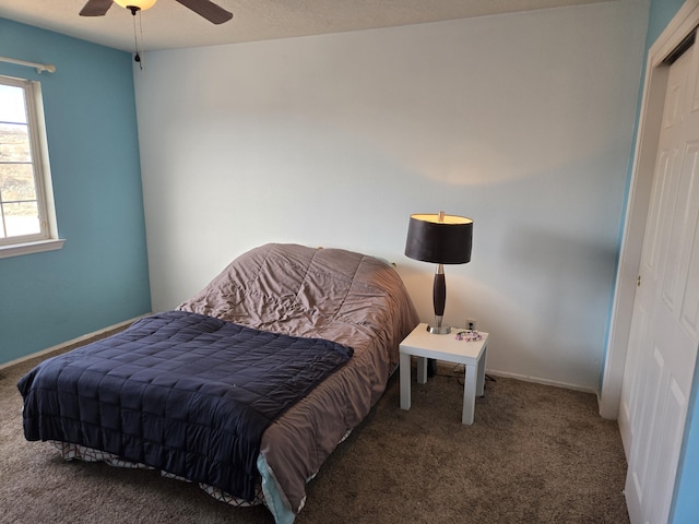 carpeted bedroom featuring ceiling fan