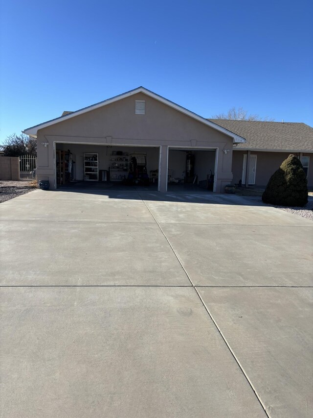 single story home with a garage