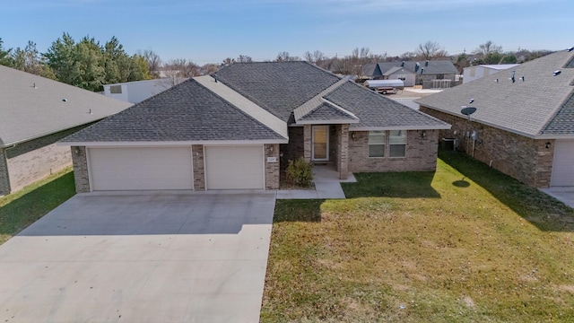 ranch-style home with a front lawn and a garage