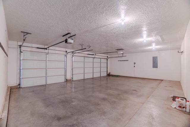 garage featuring electric panel and a garage door opener