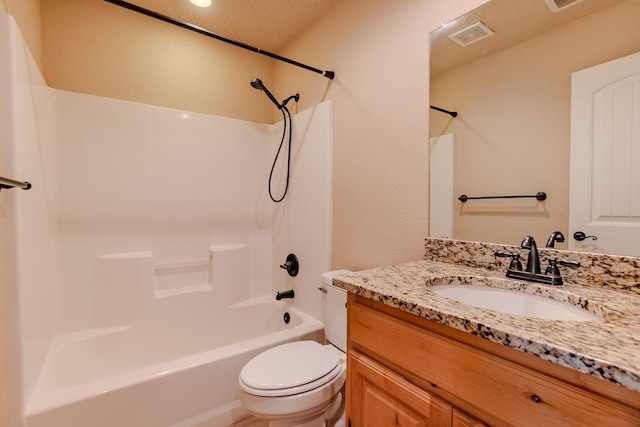 full bathroom featuring toilet, vanity, and shower / bathtub combination