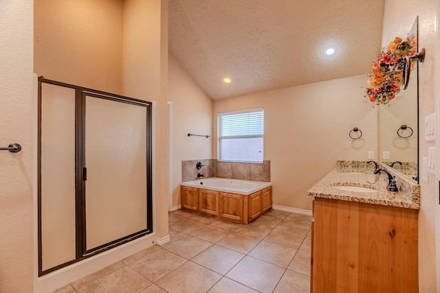 bathroom with tile patterned flooring, vaulted ceiling, independent shower and bath, a textured ceiling, and vanity