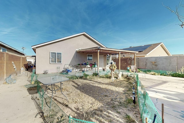 rear view of house featuring a patio area