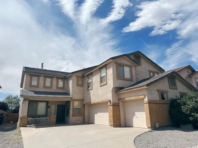 view of front of home with a garage