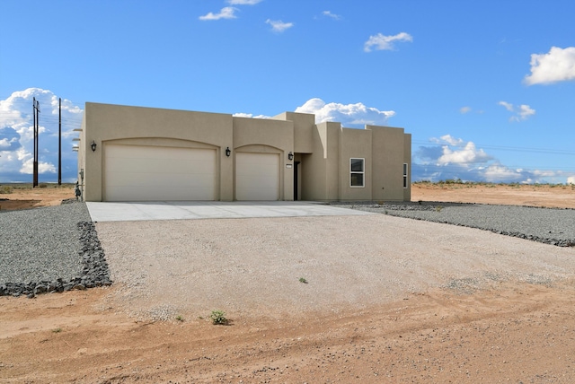 adobe home with a garage