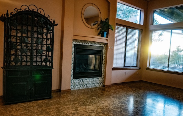 unfurnished living room featuring a fireplace