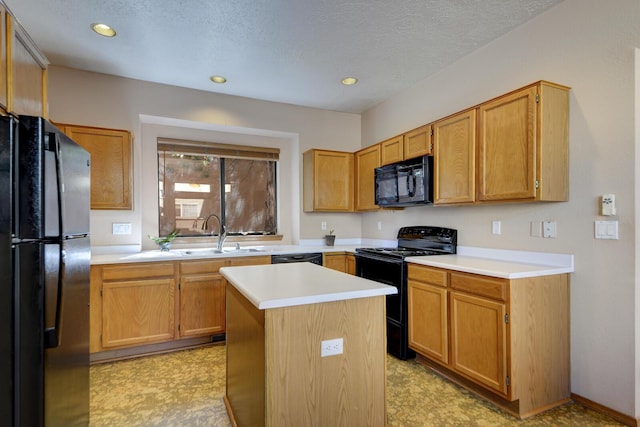 kitchen with black appliances, a kitchen island, sink, and a textured ceiling