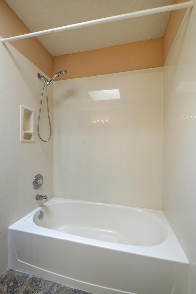 bathroom featuring shower / tub combination