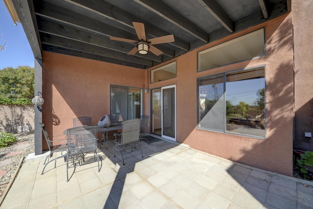 view of patio / terrace featuring ceiling fan