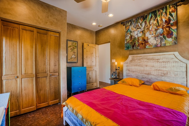 bedroom featuring ceiling fan and a closet