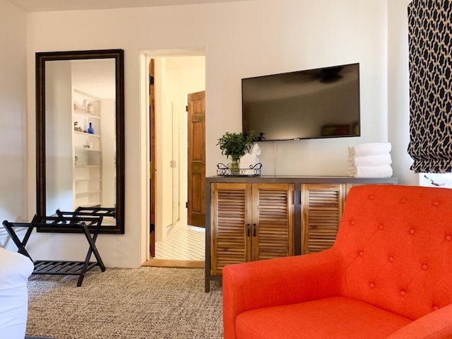 living area with carpet flooring