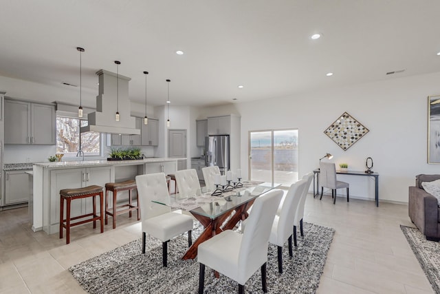 dining space featuring visible vents, recessed lighting, and baseboards