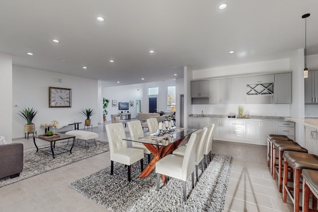 dining room with recessed lighting