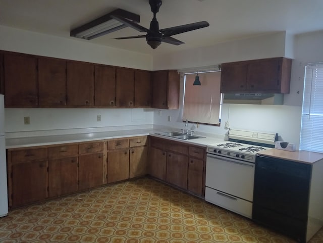 kitchen with sink, white appliances, ceiling fan, and dark brown cabinetry