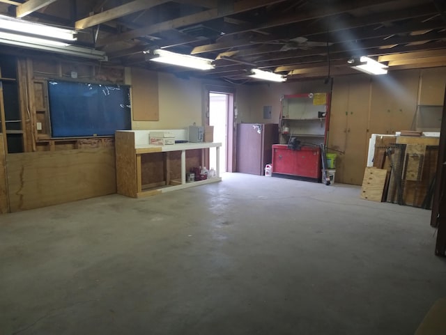 basement with a workshop area